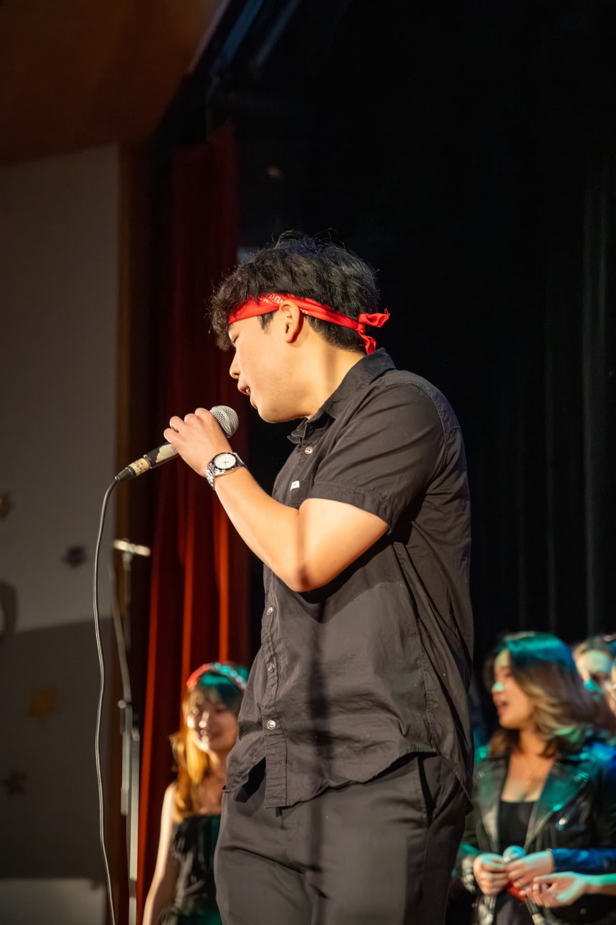 Singing lead at an a cappella showcase