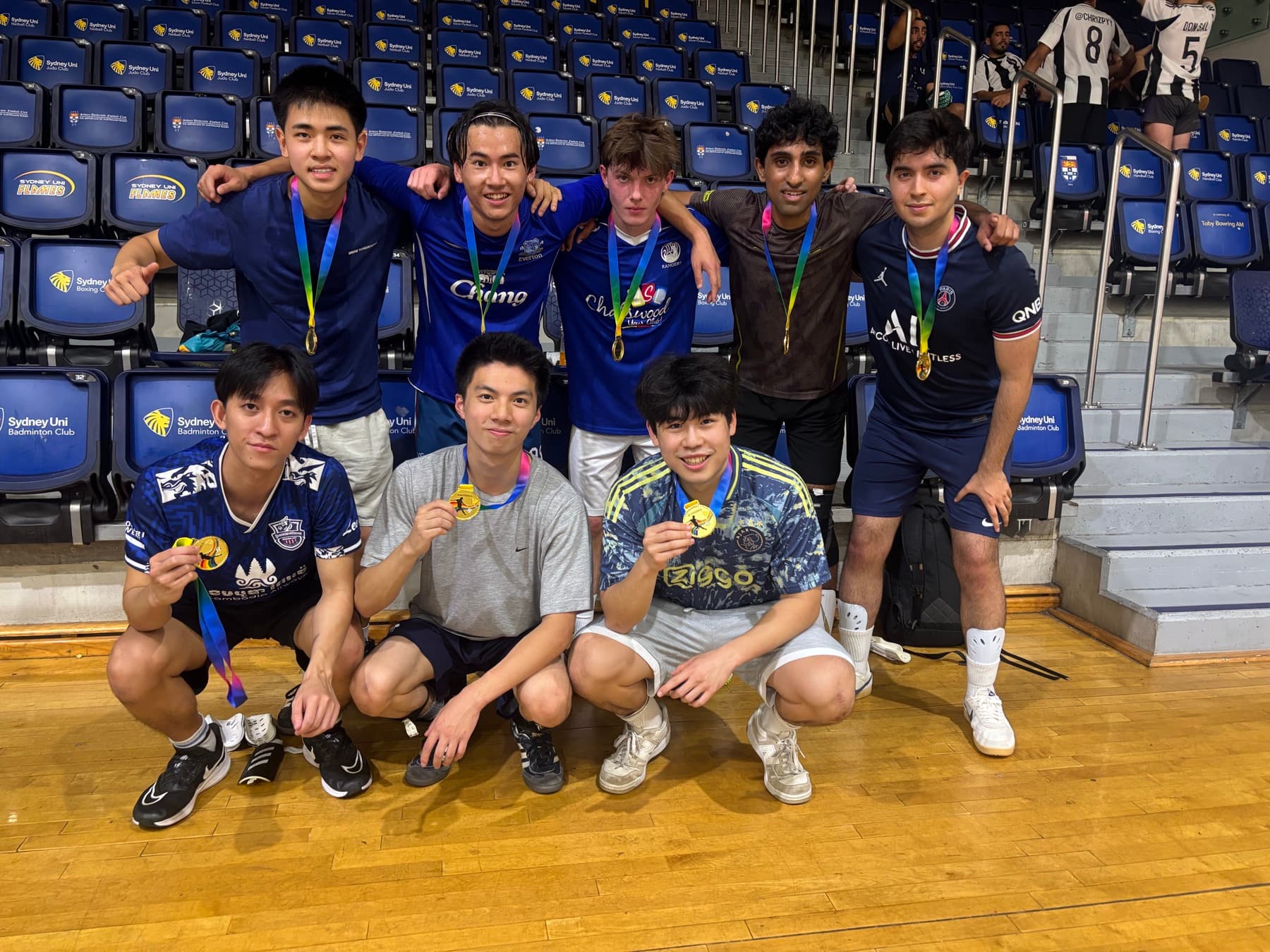 The futsal team with medals after a final at Sydney Uni
